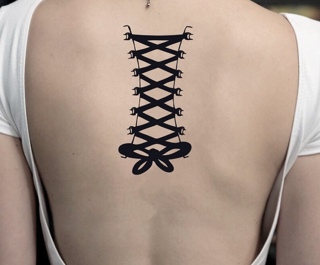 lace up logo tattoo