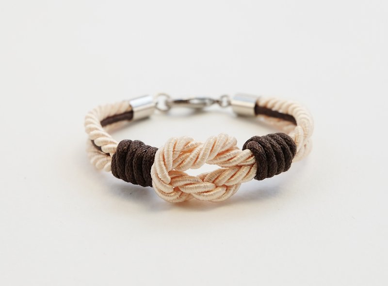 Cream tie the knot bracelet with dark brown waxed cotton cord - สร้อยข้อมือ - กระดาษ สีนำ้ตาล