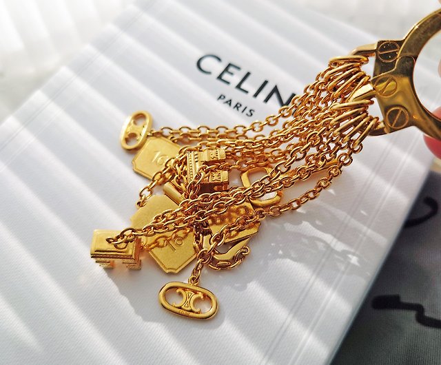 Second-hand beauty with box CELINE gold Arc de Triomphe tassel bag