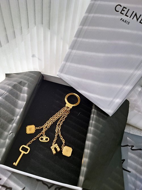 Second-hand beauty with box CELINE gold Arc de Triomphe tassel bag