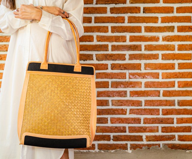 Distinctive Handwoven Krajood Bag with cane handles