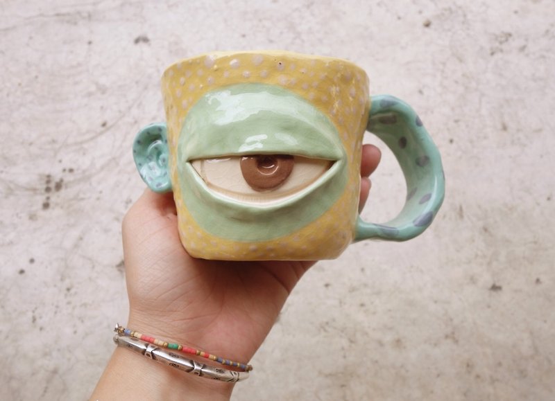 Handmade ceramic mug cup eye in yellow pastel. - Mugs - Pottery Yellow
