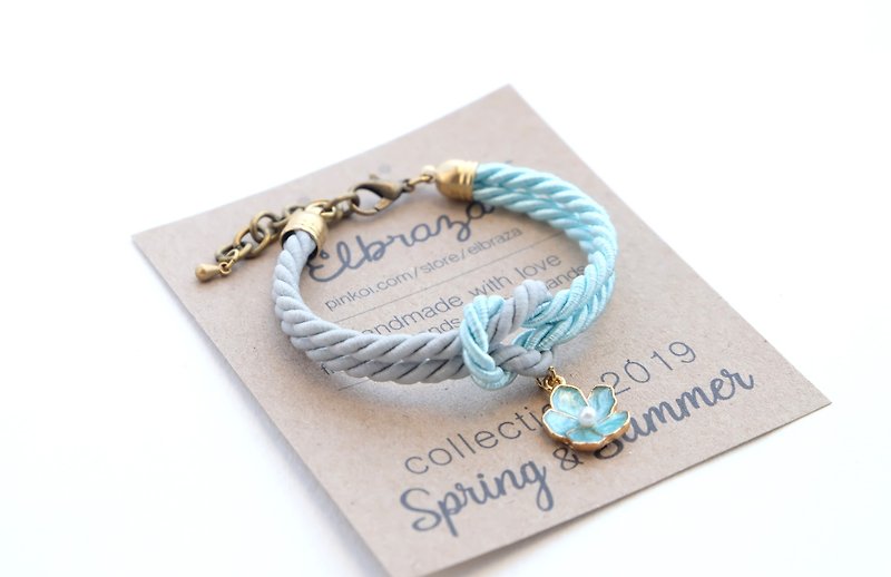 Icy blue / Matte ash knot rope bracelet with blue flower charm - สร้อยข้อมือ - วัสดุอื่นๆ สีน้ำเงิน