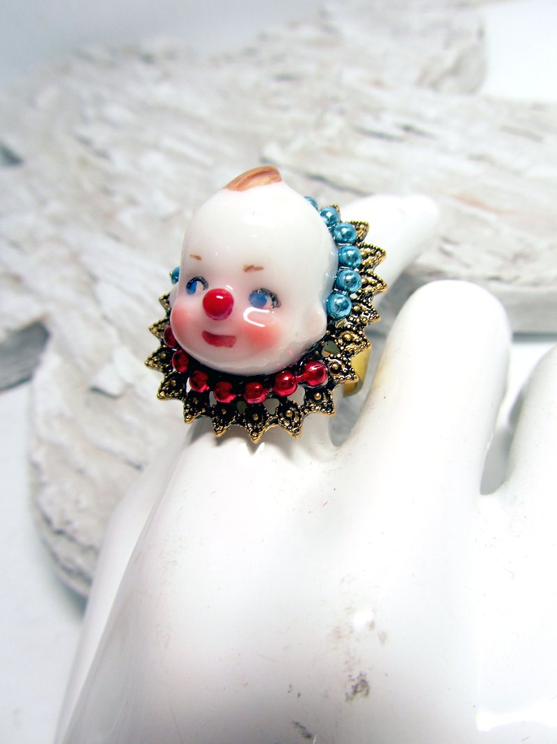 TIMBEE LO Imitation ceramic clown baby head ring noble style - General Rings - Paper Gold