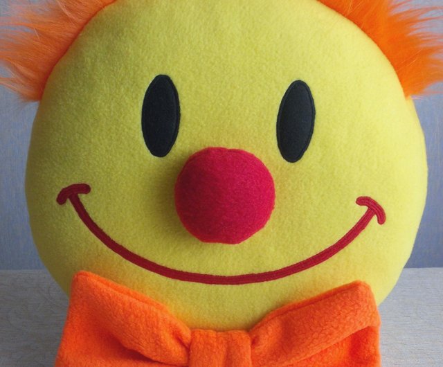 Smile with a clown nose and orange bow funny kindness pillow