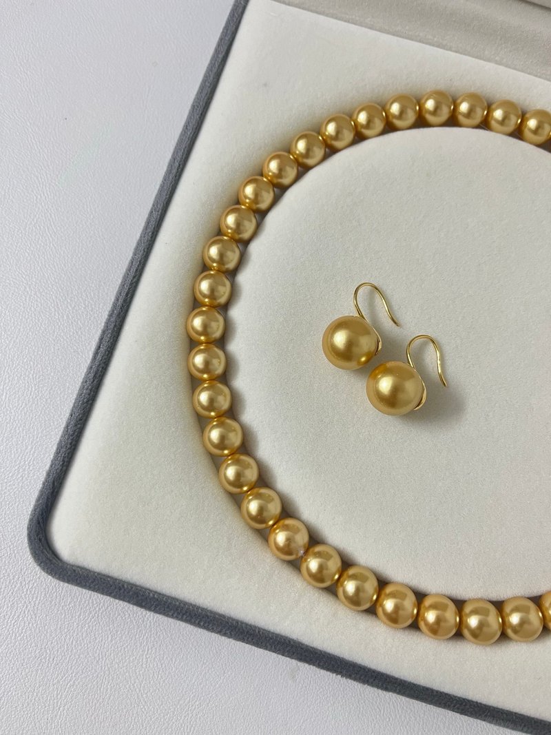 Nanyang Gold Pearl Strong Tea Gold Shijia Pearl Round Bright Light Necklace Gift - Necklaces - Other Materials Gold