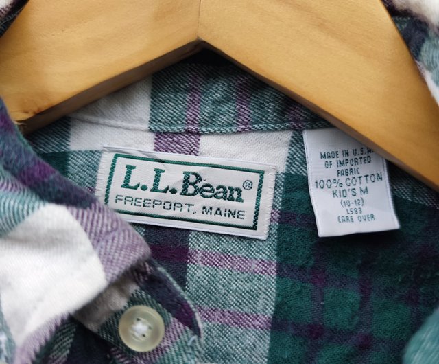 L.L. offers Bean vintage drawstring backpack flannel and leather plaid red and green