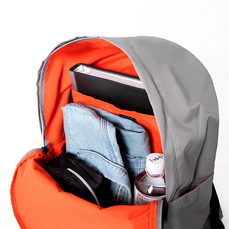 The backpack is folded for storage. gray - กระเป๋าเป้สะพายหลัง - เส้นใยสังเคราะห์ สีเทา