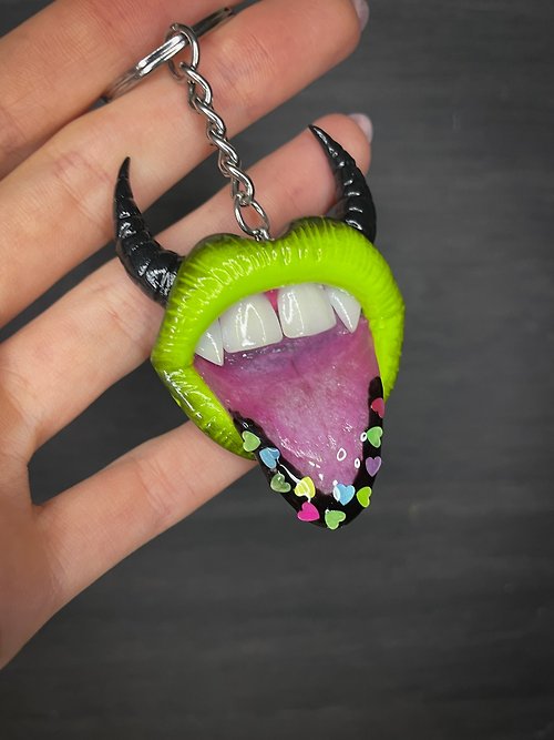Polymer Diary Keychain. Green lips with horns.