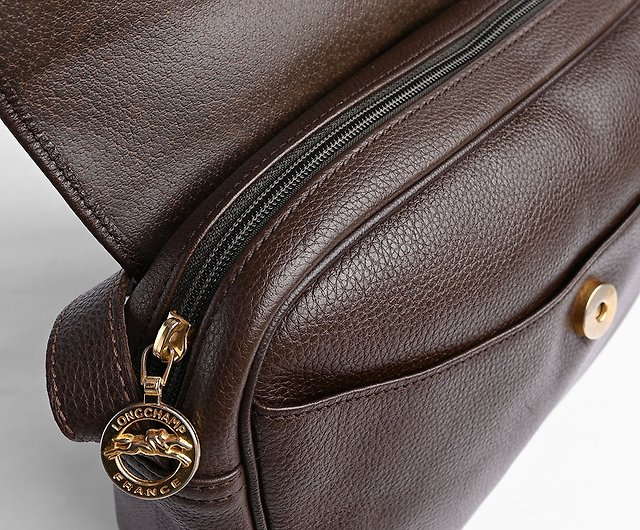 Longchamp vintage speedy signature bag IDR 1jt Size 33x24x18 Warna dark  brown motif longchamp Full leather Keren dan mewah Bag only