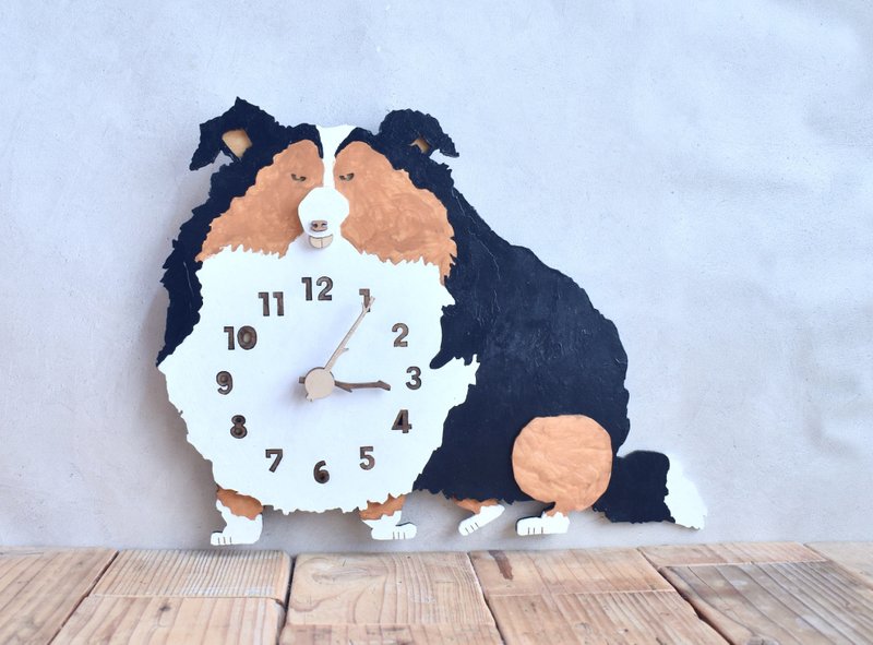 Wooden wall clock featuring a Shetland Sheepdog enjoying a dog run - Clocks - Wood Brown