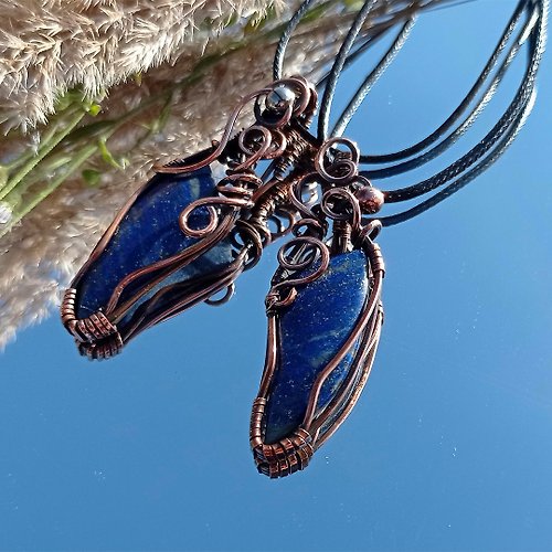 JewelryfromYana Wire wrapped pendants for a couple. Fang necklaces with lapis lazuli for a coupl