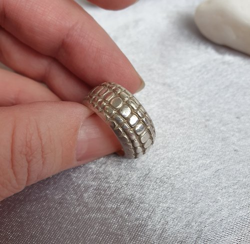 Studio Irene Silver ring with snake texture.