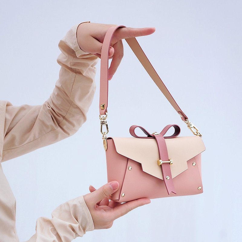 IZZMI apricot pink bow mobile phone bag small shoulder bag double-sided cowhide original handmade - กระเป๋าแมสเซนเจอร์ - หนังแท้ สึชมพู