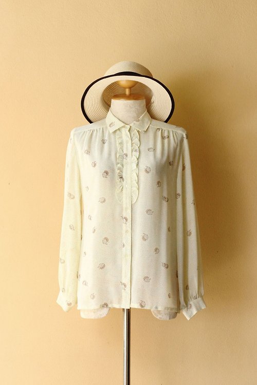 Tomorrow is Yesterday Vintage light yellow blouse with falling leaf print