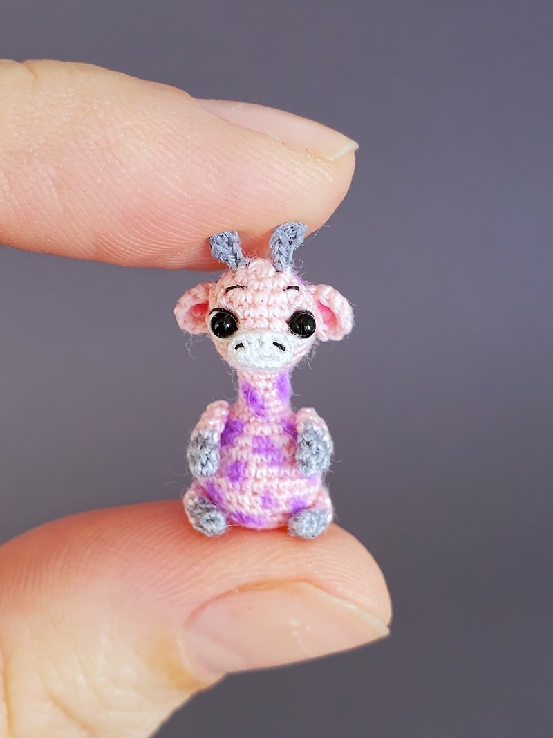 Extreme micro crocheted giraffe. Dollhouse miniature. Amigurumi stuffed toy.