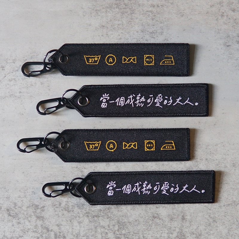 Be a mature and lovely adult. _ Electric embroidery key ring _ illegal girls x writing practice - Keychains - Cotton & Hemp Black