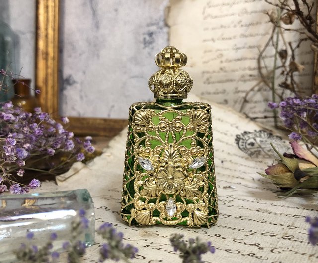 gold filigree perfume bottles