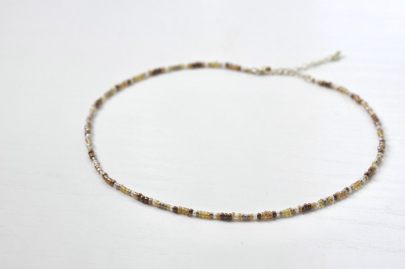 Midnight forest. Simple rice bead necklace. Amber color - Necklaces - Acrylic Brown