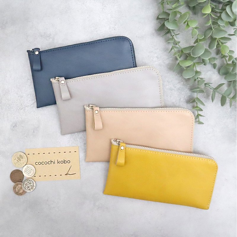 A small, slim long wallet that fits bills perfectly. Small, functional, and easy to use. Ultra-lightweight and made from high-quality vegan leather that is resistant to water and scratches. - Wallets - Other Materials Pink