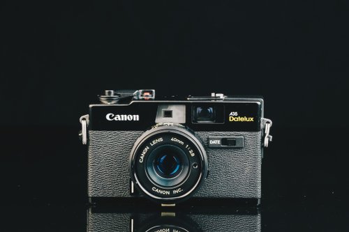 Canon A35 Datelux フィルムカメラ Canon A35 Datelux (1977) features pop-up-flash and date stamping