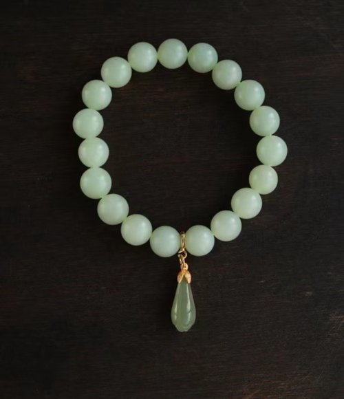 Angel's tears 天使之淚 Jewelry Design 10mm天然和田玉 /和闐玉-漸變色晴水玉 鎏金玉蘭花設計單圈手串m