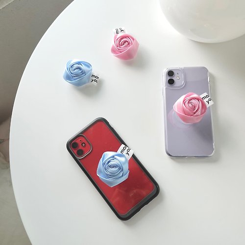 morethanyoursee Rose Phone grip, Popsocket, Phone Holder, Griptok attached to the back of a mobile phone.