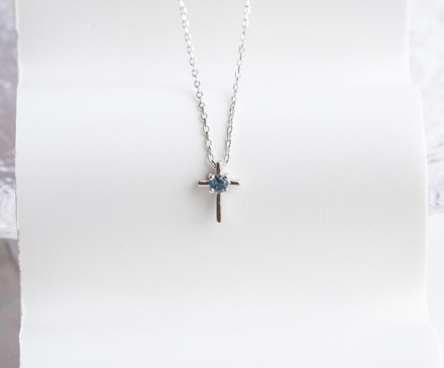 blue and silver cross necklace