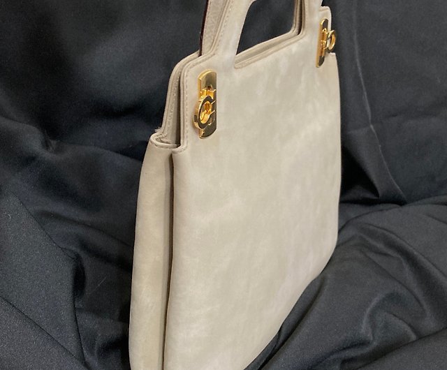 S off-white leather trapezium bag