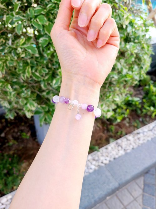 purple and white bracelet