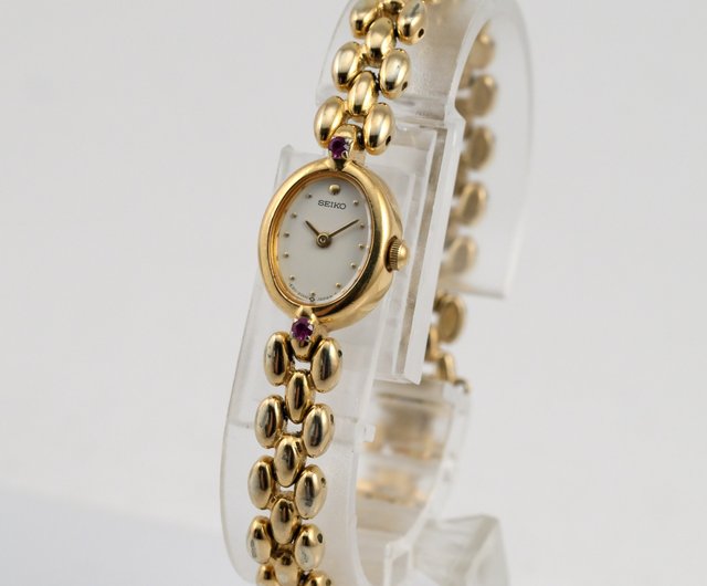SEIKO 1E20-6140 女性用腕時計 クォーツ ゴールドブレスレット カラー