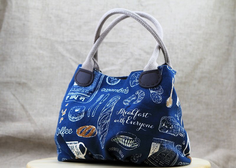 A hand-held candy bulging bag - Blue Monday breakfast (coffee and a half months woven carrying handle) - กระเป๋าถือ - ผ้าฝ้าย/ผ้าลินิน สีน้ำเงิน