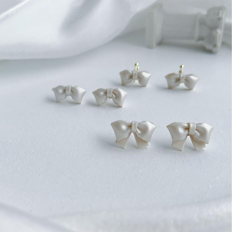MINIPANG original niche jewelry gift pearlescent bow imported soft clay earrings ear clip ear bone clip - Earrings & Clip-ons - Clay White