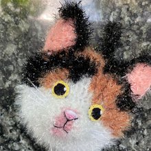 カスタマイズされた三毛猫の形をした韓国製ワイヤーモップ。食器を洗う。クリーン