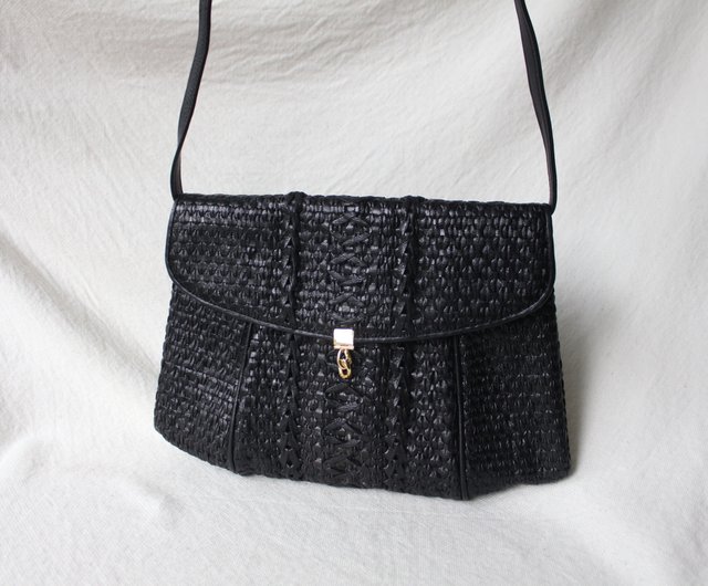 Vintage woven leather clutch bag with strap