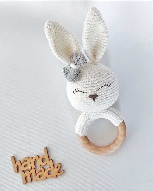 Knitting magic Rattle-rodent bunny for babies .Thanks to the knitted textur