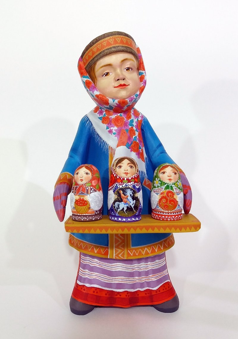 Wooden figurine of a girl with matryoshkas 8.66 inches 22 cm is completely handm