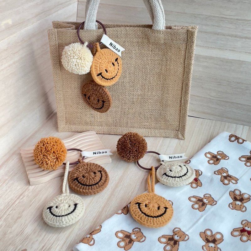 Handmade wool knitted double-sided smiling face pom pom pendant with two smiling faces + 1 pom pom in Maillard color - ที่ห้อยกุญแจ - ผ้าฝ้าย/ผ้าลินิน สีนำ้ตาล