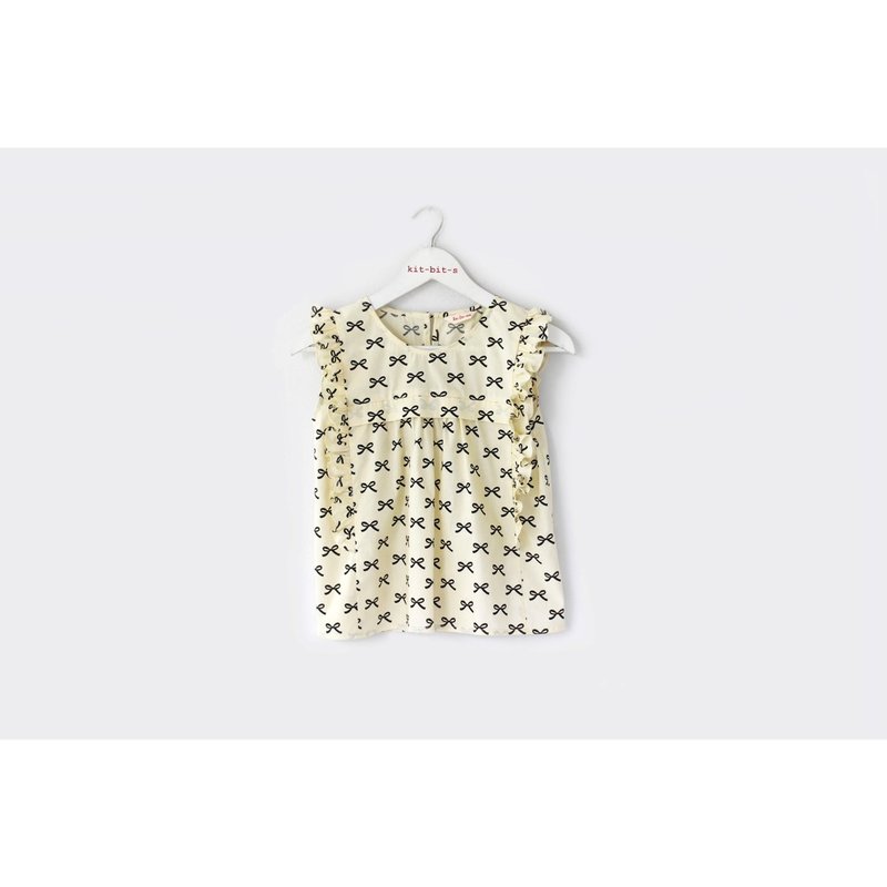 Sleeveless shirt with ruffled bow pattern. - Women's Tops - Cotton & Hemp Khaki