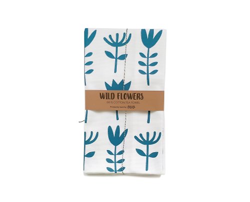 Olula Blue tea towel made of hand-printed cotton with floral print. Cheer up your home