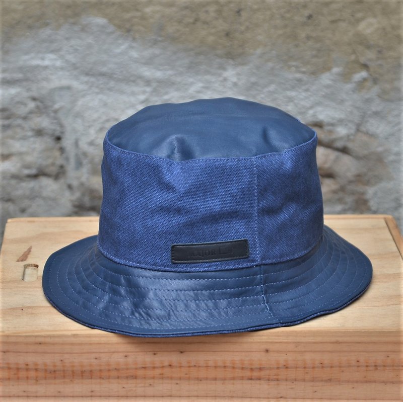 [Autumn and winter new fashion] Fisherman hat blue MAJORLIN leather and wine bag cloth double material retro flavor - หมวก - หนังแท้ สีน้ำเงิน