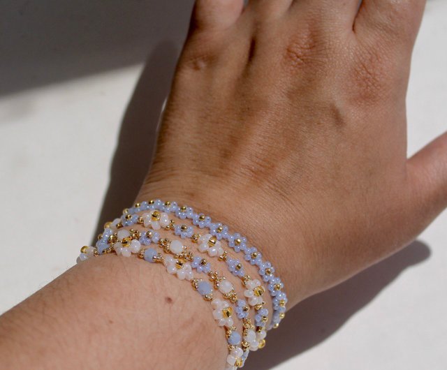 Louis Vuitton White/Blue Beaded Bracelet - Yoogi's Closet