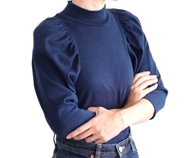 An adult high-neck gathered sleeve T-shirt with a focus on shape