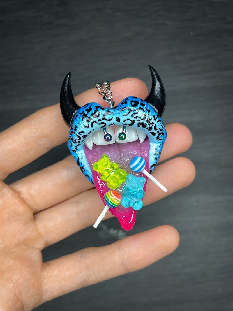 Pendant. Blue lips with horns. - Necklaces - Clay 