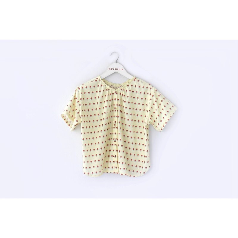 The shirt has sleeves decorated with tiny ruffles around the neck. - Women's Shirts - Cotton & Hemp 