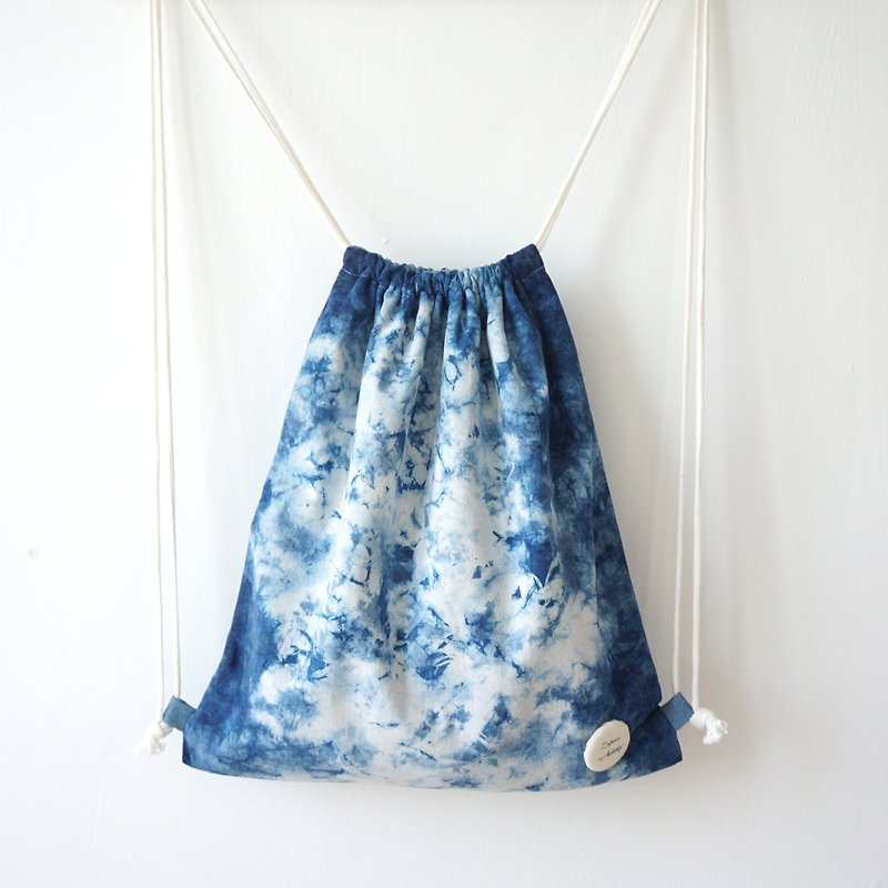 S.A x Sky, Indigo dyed Handmade Natural Pattern Backpack - กระเป๋าหูรูด - ผ้าฝ้าย/ผ้าลินิน สีน้ำเงิน