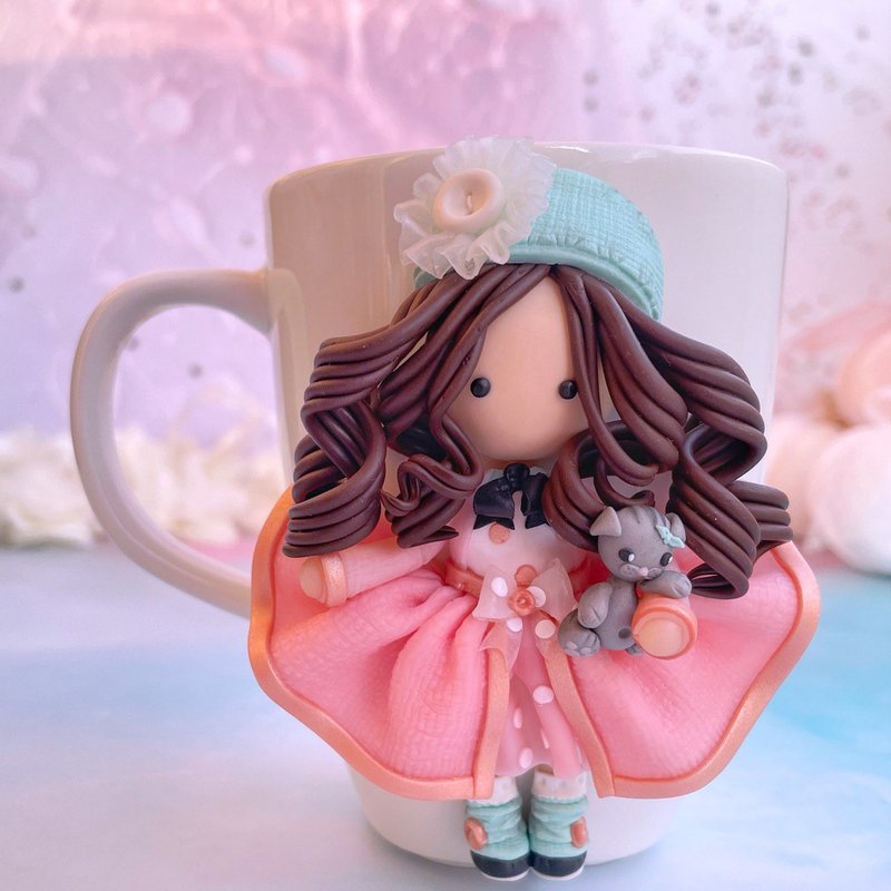 Mug girl with a kitten in soft pink shades of coat and turquoise beret. - แก้วมัค/แก้วกาแฟ - ดินเหนียว สึชมพู