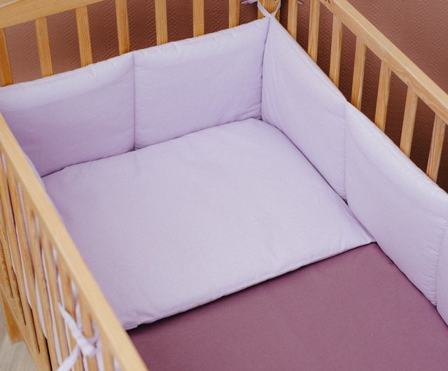 Bumper guard outlet for crib