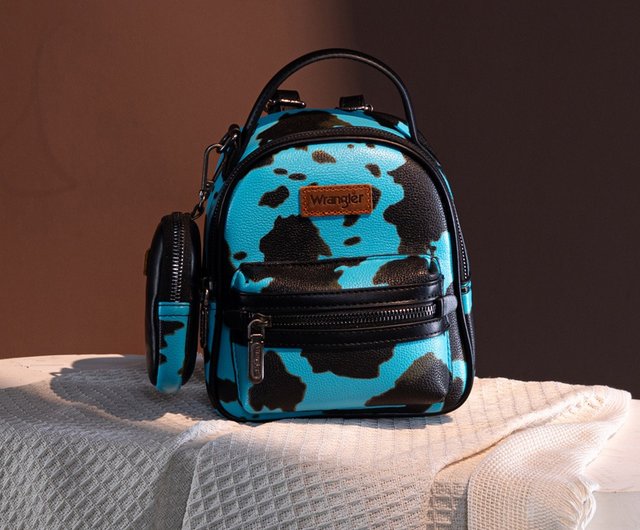 Cow print mini backpack on sale