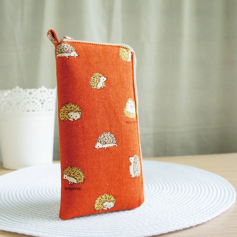 Lovely [Japanese cloth] brick orange ball hedgehog cotton 5 inch mobile phone bag, glasses bag, with compartment - เคส/ซองมือถือ - ผ้าฝ้าย/ผ้าลินิน สีส้ม